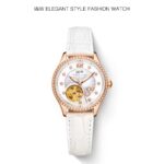 Gold dial and white strap